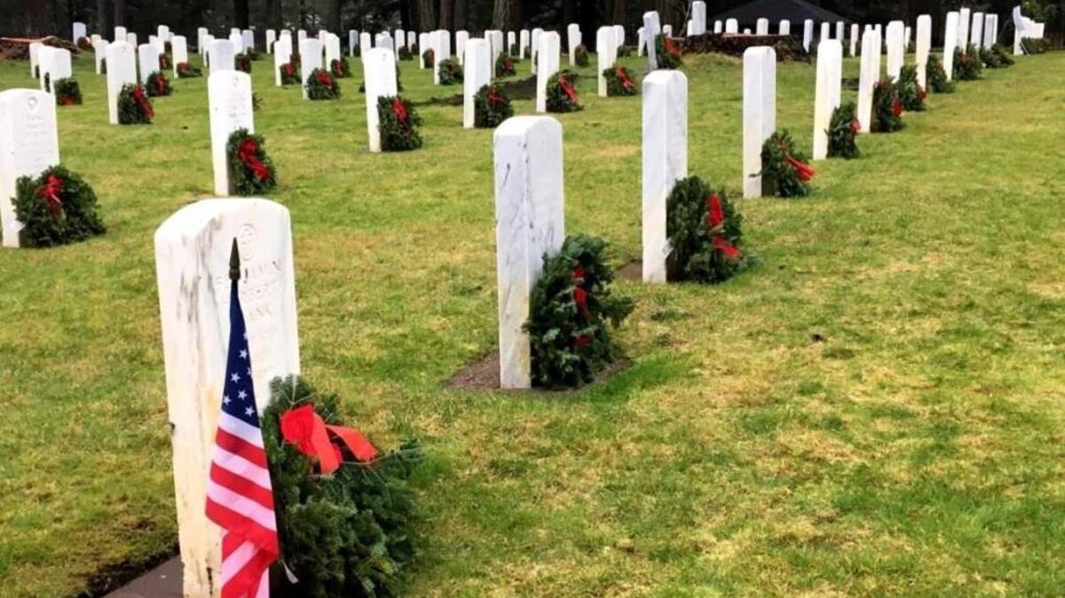 “Volunteers placed holiday Remembrance Wreaths on all 1,194 Veterans' graves at the Camp Lewis Cemetery this morning as part of the National Wreaths Across America Day Ceremony,” reads a tweet from JBLM.