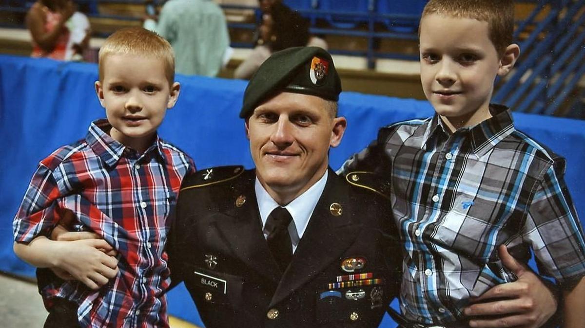 Staff Sgt. Bryan Black and his sons Isaac (left) and Ezekiel.