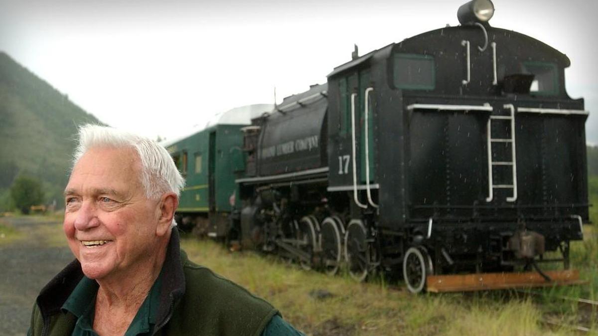 Tom Murray stands by one of the steam engines at the Mt. Rainier Scenic Railroad and Logging Museum in Mineral.