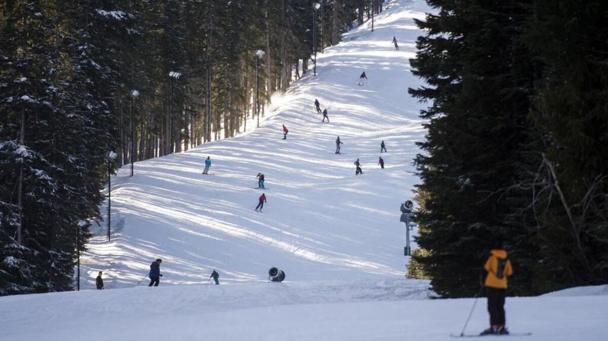 Skiers and snowboarders hit the slopes at Crystal Mountain Resort on Sunday, Dec. 31, 2017.