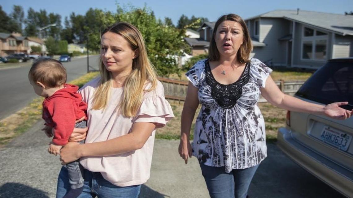 Pacific residents Anna Shtogryn, seen here with her 7-month-old son Jonathan, and Samantha Niemi have sued Honey Bucket, contending the company’s plant in Pacific is releasing harmful smells and fumes. A Pierce County judge recently expanded their lawsuit into a class action.