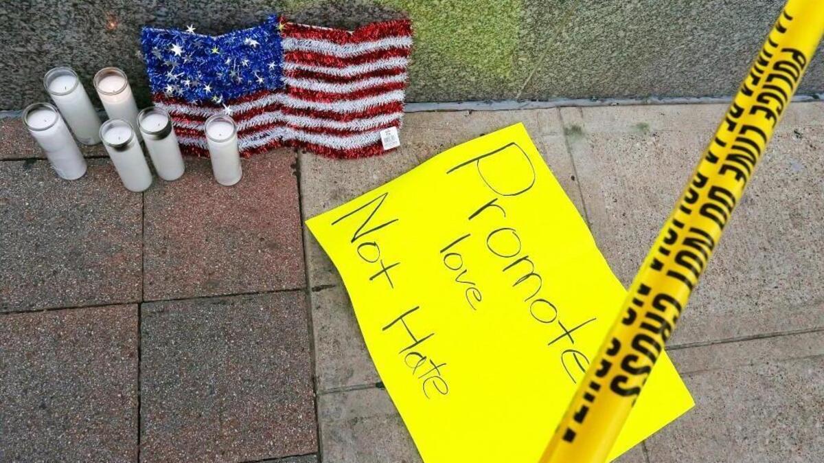 A small memorial at the Greyhound Bus Station about a block from the shooting scene in Dallas.