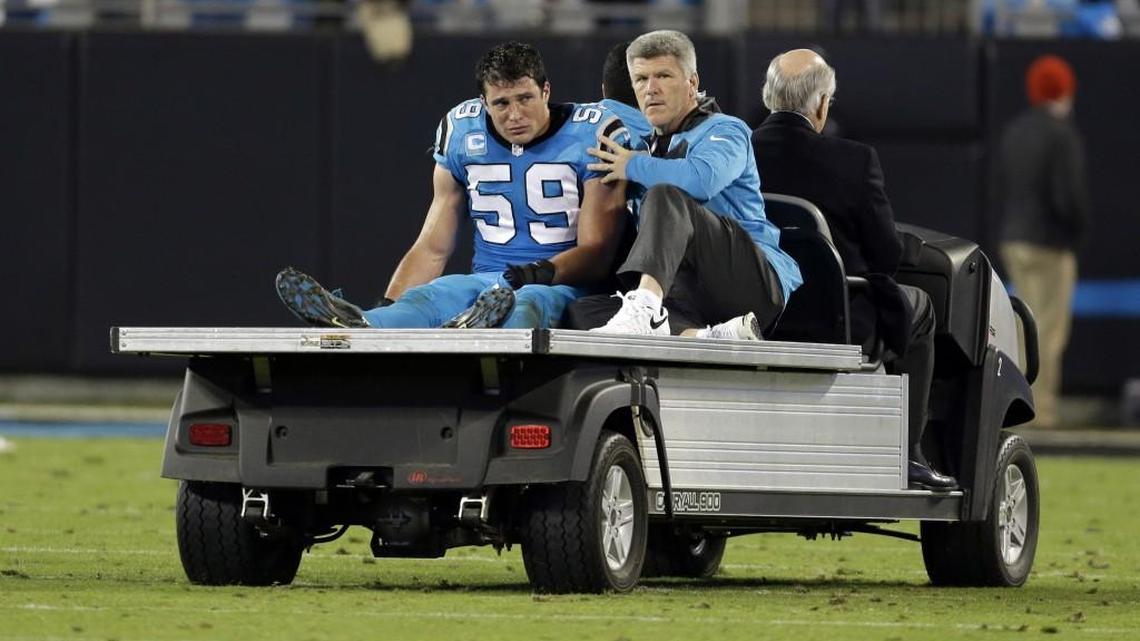 FILE - In this Nov. 17, 2016, file photo, Carolina Panthers’ Luke Kuechly (59) is taken off the field after being injured in the second half of an NFL football game against the New Orleans Saints, in Charlotte, N.C. Kuechly has missed nine games in the past two seasons because of concussions.