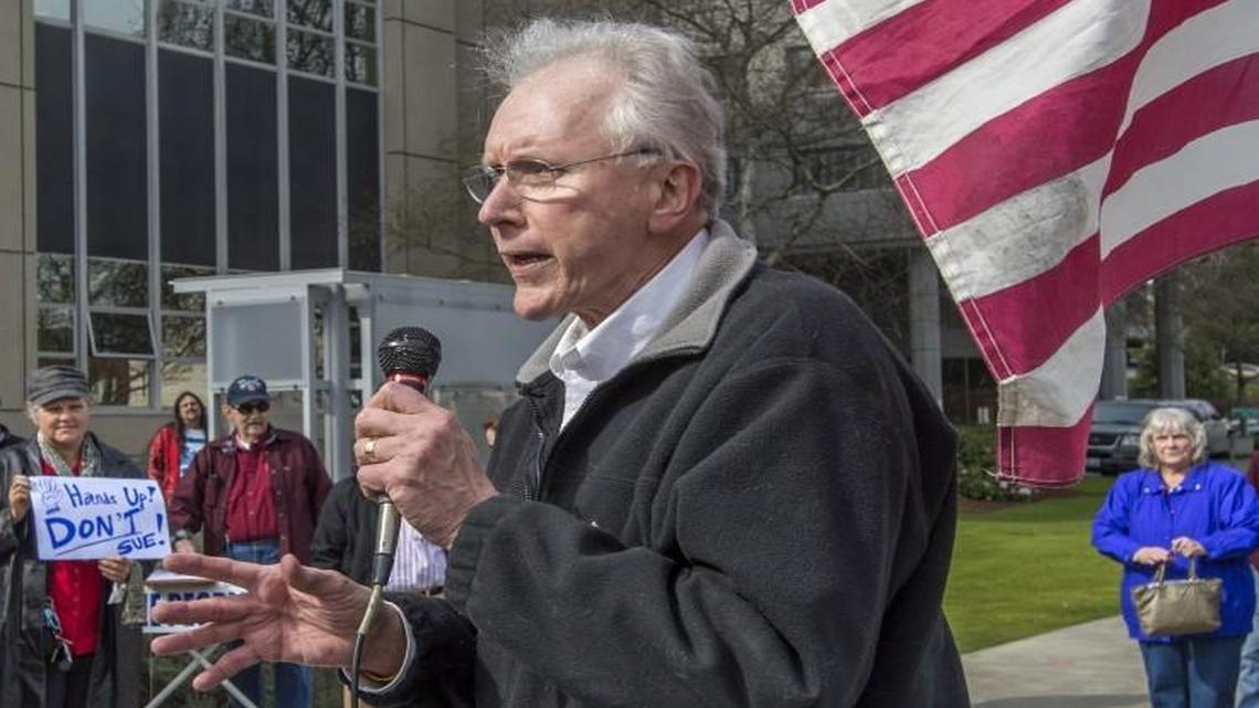 Jerry Gibbs addresses a crowd outside the County-City Building in Tacoma in 2015.