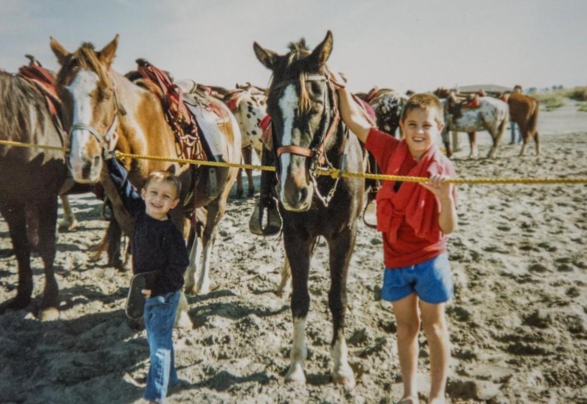 Undated picture of Noah Van Houten, left, and his brother Jason during one the family's trips to the ocean.