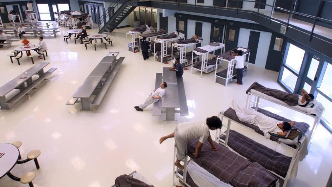 
Detainees, shown in 2010, are kept in cells and a common area at the Northwest Detention Center. People waiting for their immigration status to be determined or those who are awaiting repatriation are housed there.