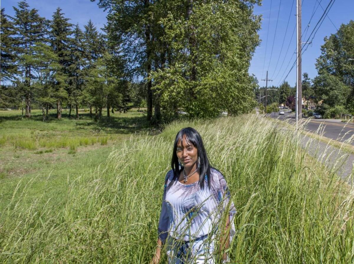 Shalisa Hayes stands at the site of the future East Side Community Center at E. 56th street and Portland Avenue. The state-of-the-art community center is something Tacoma’s East Side has been sorely lacking.