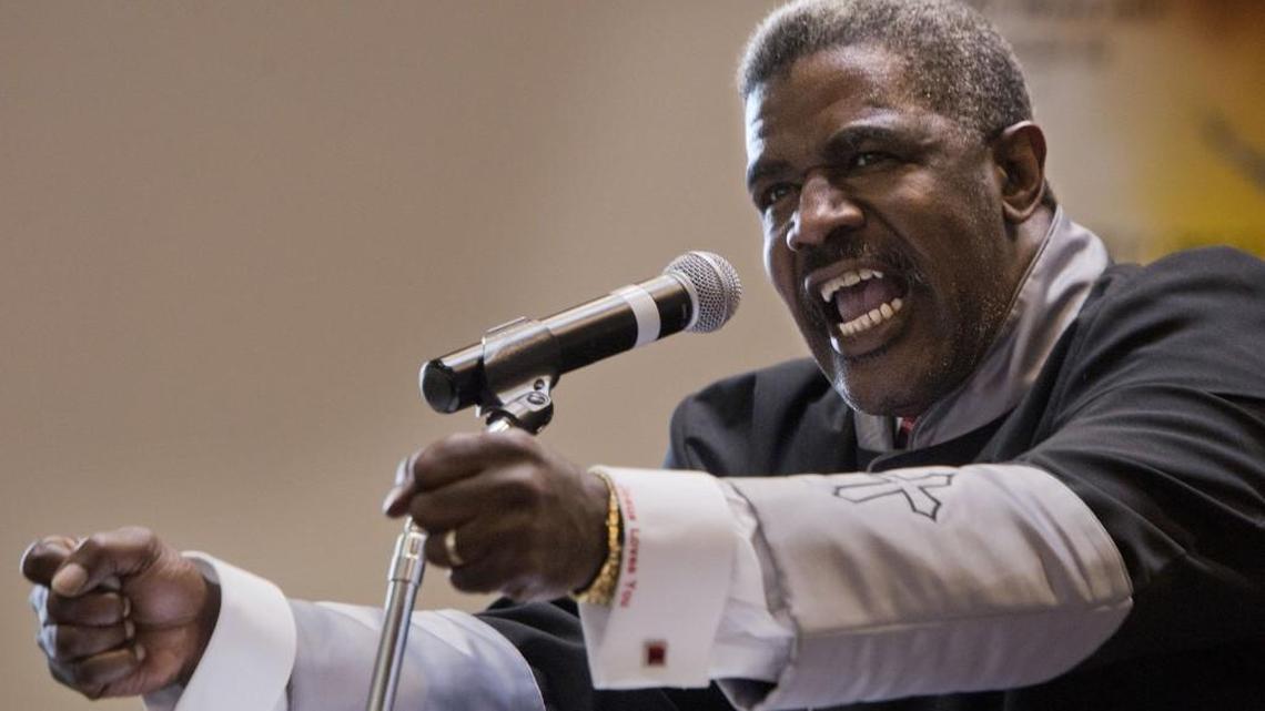 Rev. Gregory Christopher during a Sunday service at the Shiloh Baptist Church in Tacoma on Sunday, August 11, 2013. Photo by Lui Kit Wong/Staff photographer