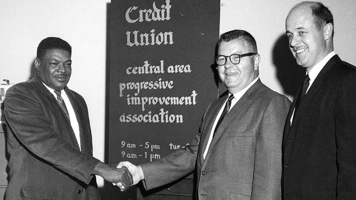 A.L. “Slim” Rasmussen, seen here in glasses, congratulates Wallace Walker Sr., for his work with the Central Area Progressive Improvement Association in this 1968 photo. Andrew Hess, Federal Housing Administration regional director, is on Rasmussen’s right. Rasmussen was described as “irascible” by some, and his mayoral campaigns often were mudslinging donnybrooks, according to former Tacoma mayor and local historian Bill Baarsma.