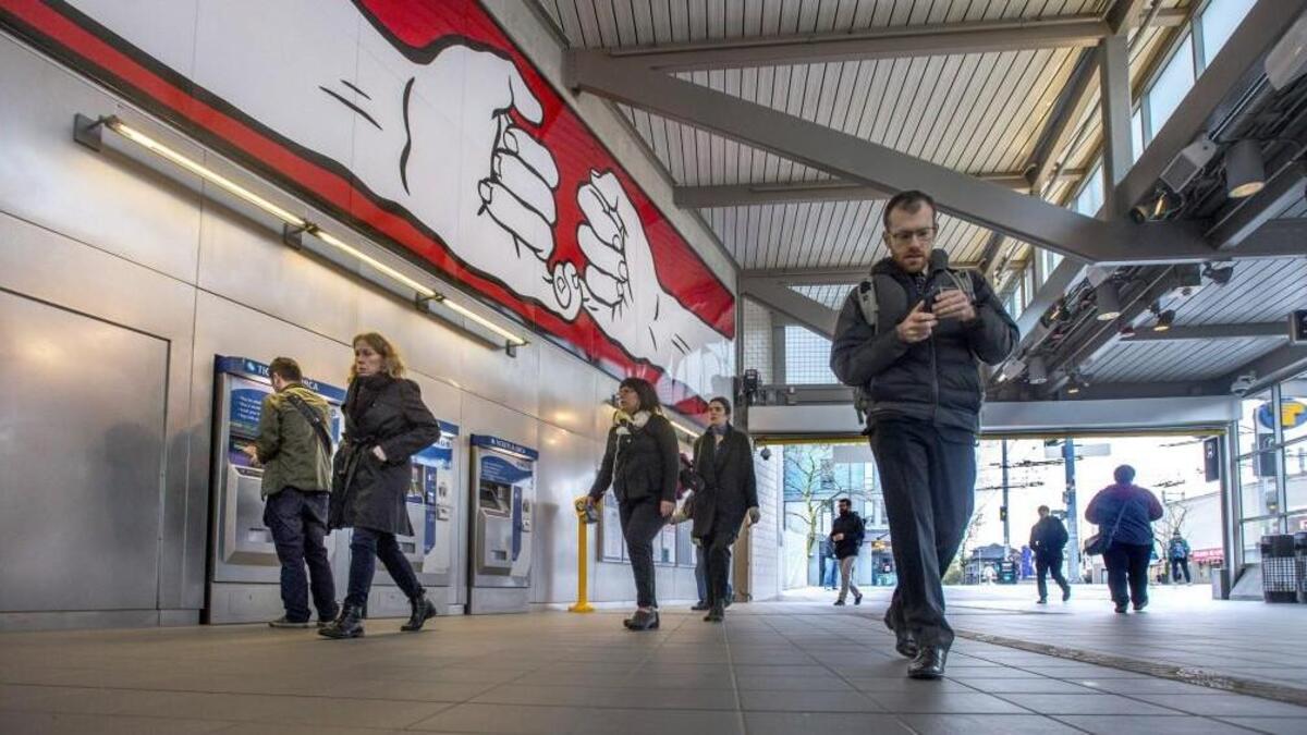 Commuters catch Sound Transit’s light rail trains in the Capitol Hill station in Seattle on March 28.