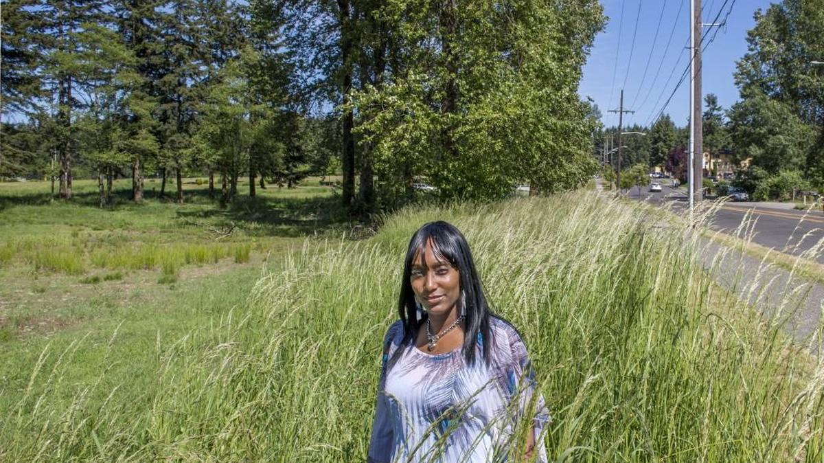 Shalisa Hayes stands last week at the location of the future East Side Community Center at East 56th Street and Portland Avenue. She has been active in the cause to create it and is the mother of Billy Ray Shirley III, who was killed by gunfire in 2011.