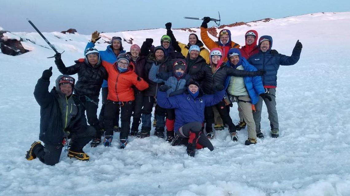Tacoma Rescue Mission Executive Director Mike Johnson (center) leads this year’s Mt. Rainier climb team.