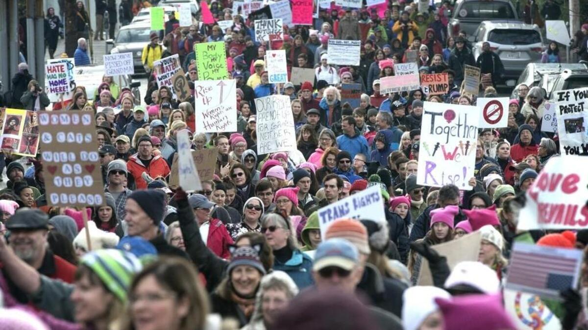 Thousands of marchers fill Columbia Street during the Women's March through downtown Olympia on Saturday, Jan. 21, 2017.