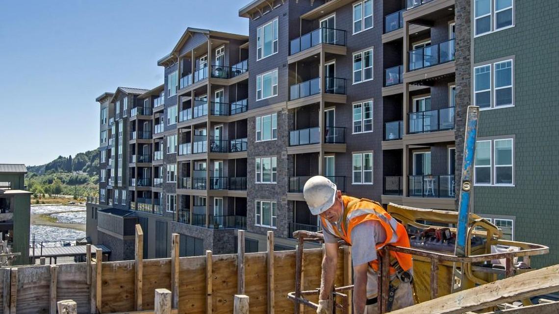 Rostislav Borisnicevien works on the Copperline at Point Ruston in 2014. A new building across from The Copperline might include affordable units.