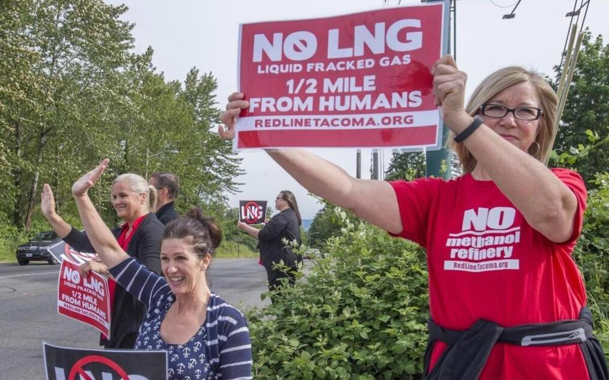 Members of RedLine Tacoma gather in Northeast Tacoma on May 17, 2016 to demonstrate their opposition to a liquified natural gas plant that is proposed for the Tacoma Tideflats. They are, right to left, Nanette Reetz, Patty Walker and Amy Siltanen.