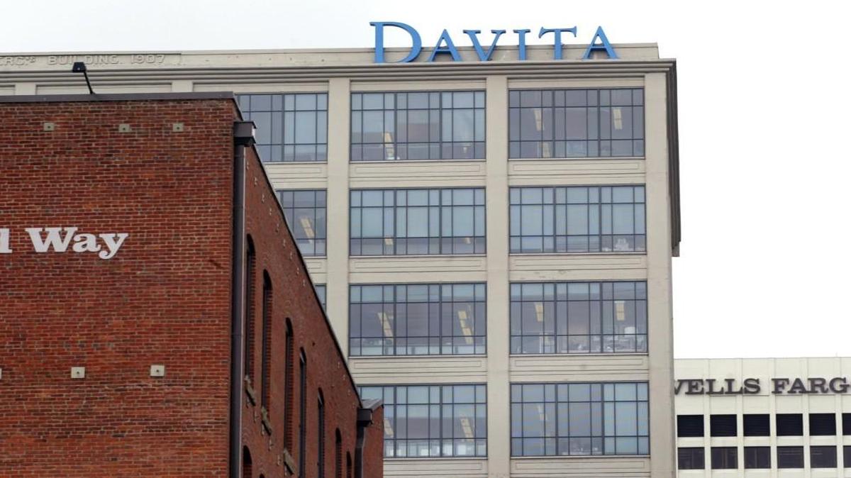DaVita, seen here at its former Tacoma office building in 2008, is reducing the number of office workers at its Federal Way campus.
