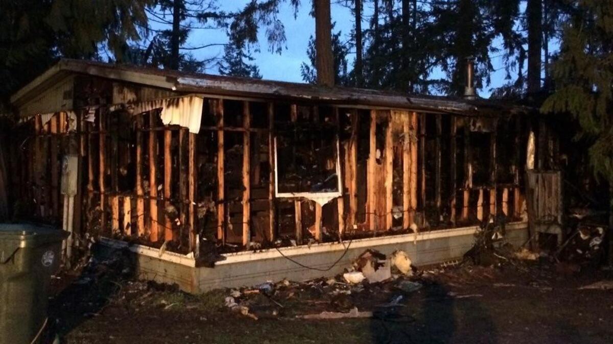 A man is in critical condition after a fire early Tuesday at a Spanaway mobile home.