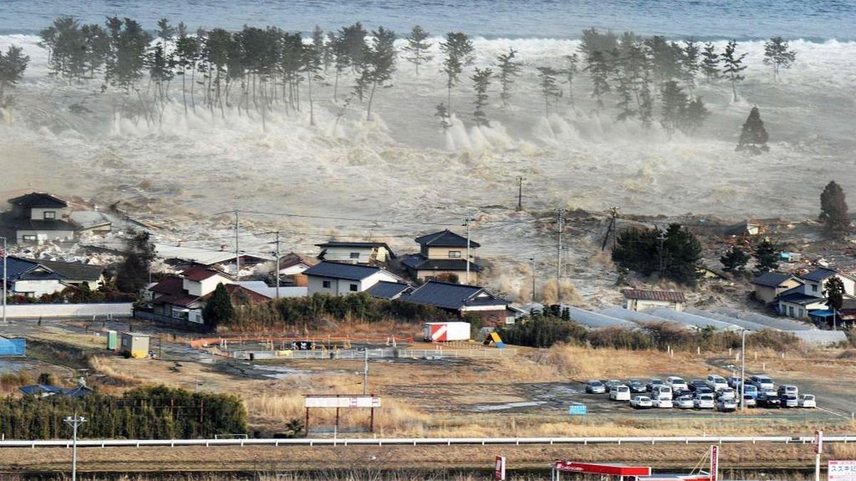 Waves of tsunami hit residences after a powerful earthquake in Natori, Miyagi prefecture, Japan, on March 11, 2011. It was the largest earthquake in Japan's recorded history.