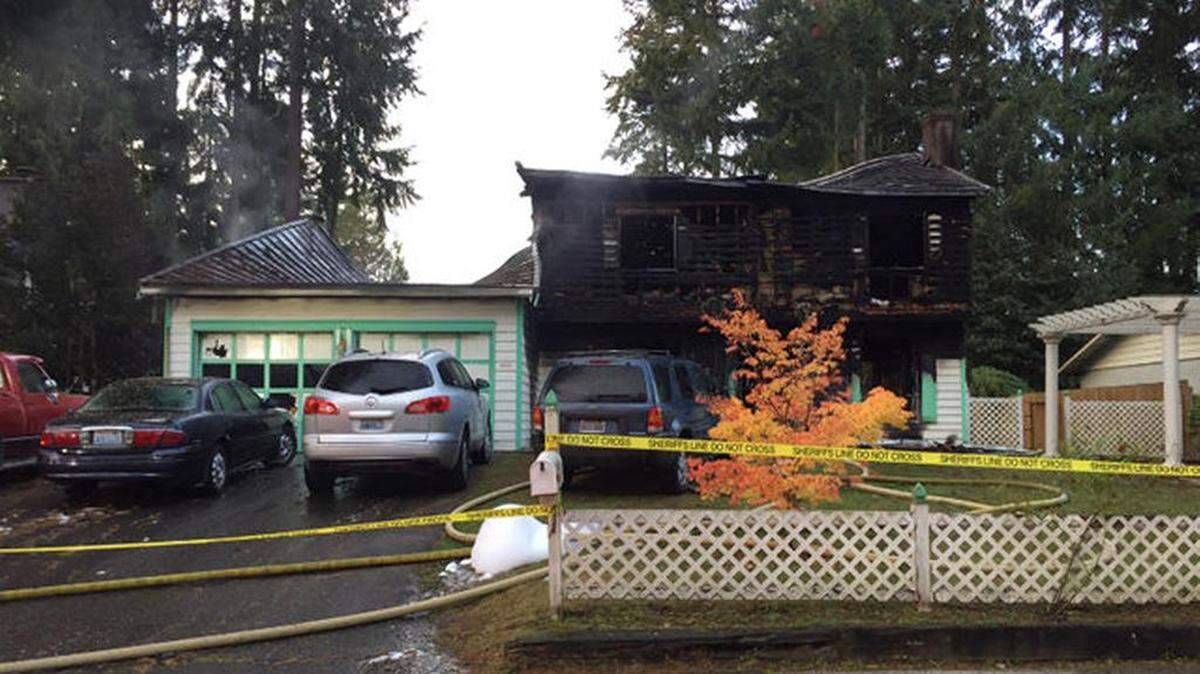 Four people are dead as a result of a fire that blazed through and charred a home near Port Orchard on Saturday morning.