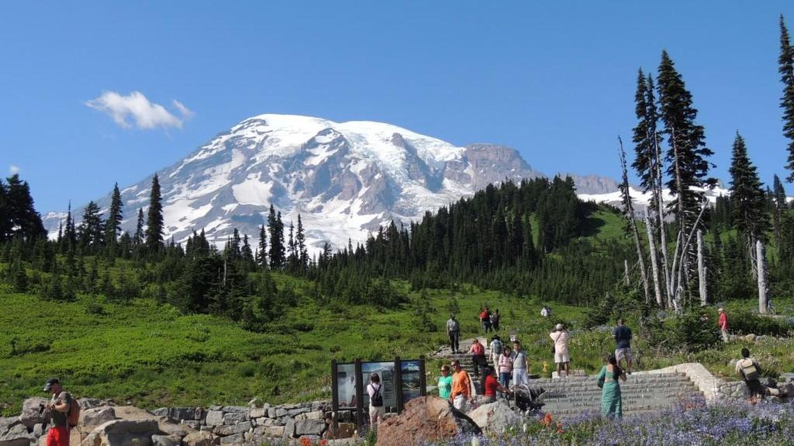Visitors enjoy the paved trails around Paradise at Mount Rainier National Park. The National Park Service is proposing raising fees at Mount Rainier and 16 other parks to help clear a maintenance backlog.