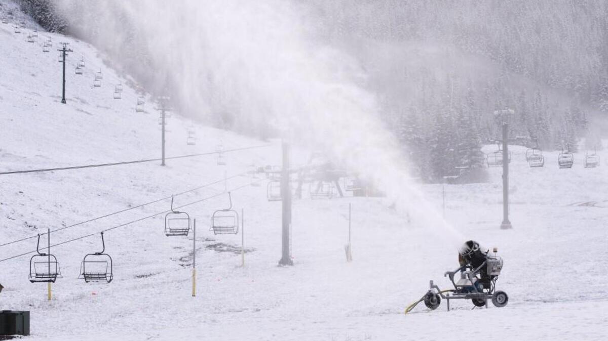 A snow-making machine blows out snow at the ski area for the upcoming season at Crystal Mountain Resort on Wednesday. John Kircher, Crystal Mountain Resort general manager, hopes to open the ski season on the Thanksgiving weekend.