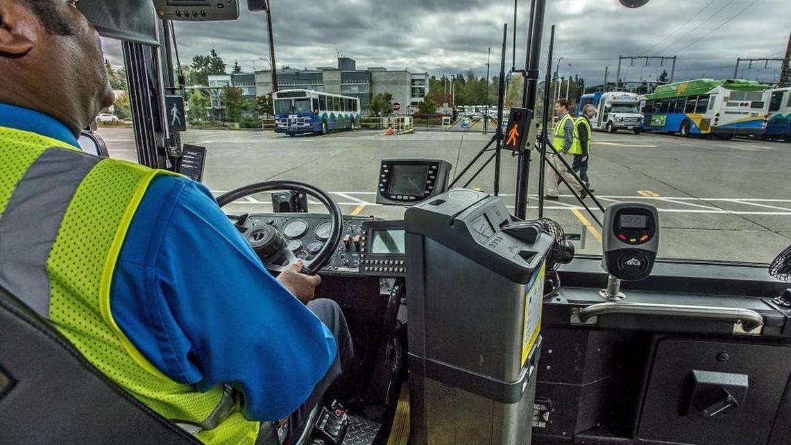 Marvino Gilliam, Pierce Transit’s safety and service quality administrator, demonstrates a Mobileye Collision Avoidance System that gives bus drivers a warning when their vehicles comes too close to a pedestrian or another vehicle. Driving around their training facility on South Tacoma Way on Wednesday, Gilliam shows how alarms and warning signs inside the bus come on when a pedestrian crosses the path of the bus.