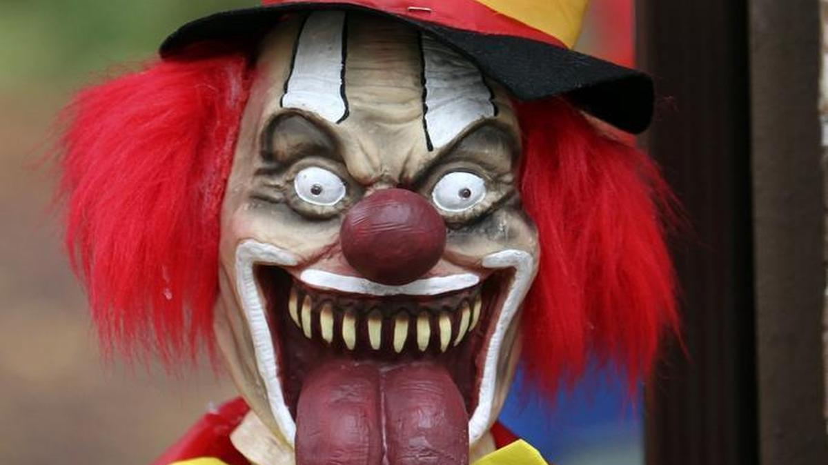 A clown is among the hundreds of decorative pieces adorning the Gig Harbor home of Daniel and Tracy Perkins.