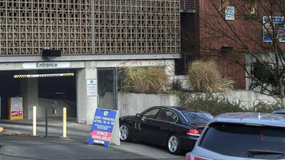 Vehicles line up to enter the garage at 10th and Yakima for jurors to park for jury duty in Tacoma in November. Parking for jurors at the County-City Building is scarce, and many jurors wind up paying for their own parking or walking blocks and blocks to serve their jury duty. Superior Court leaders are lobbying the County Council for help.