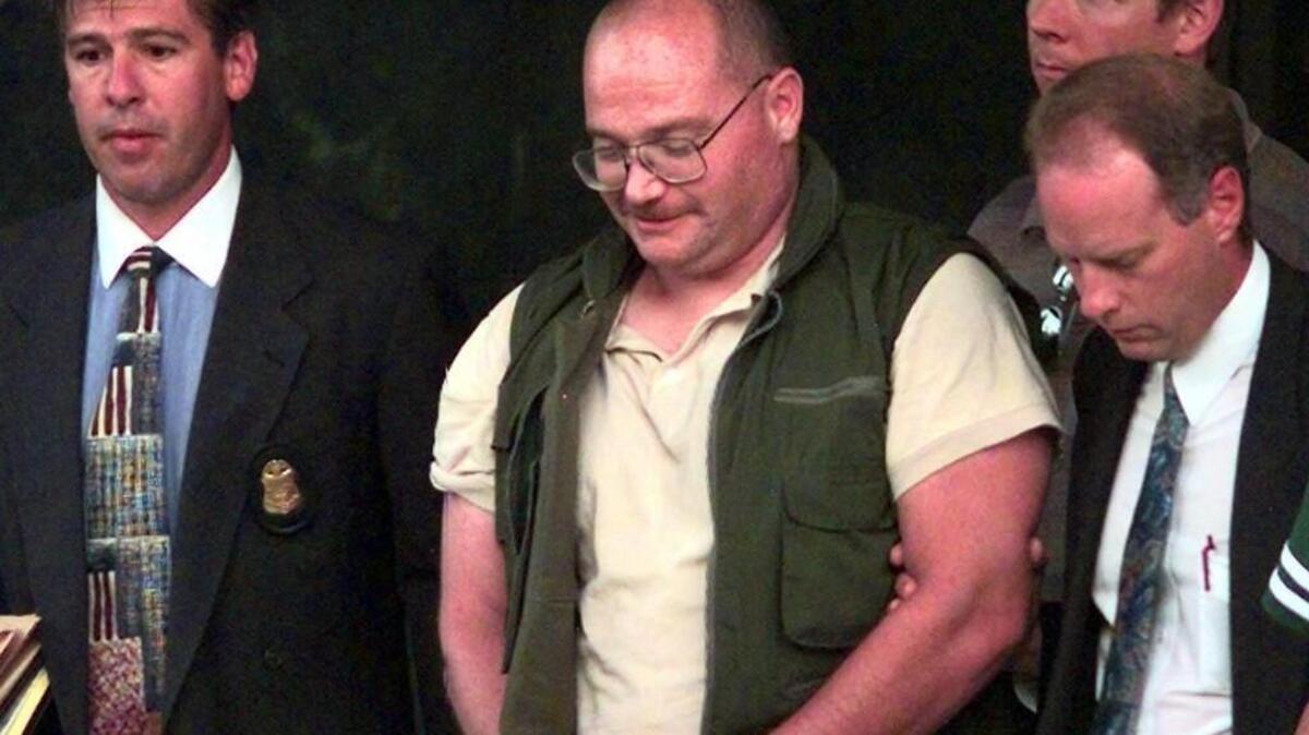 Buford Furrow Jr., an avowed white separatist who grew up in Thurston County, shot and killed a Los Angeles postal worker and then opened fire at a nearby Jewish community day-care center, wounding five people.