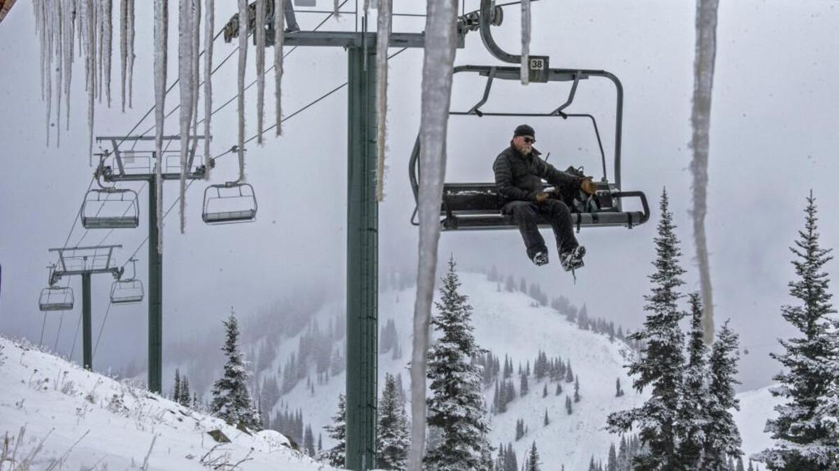 Bob Reeves, head of lift maintennance, returns to the top of Green Valley Express at Crystal Mountain on November 9, 2015. The ski area hopes to launch its 2017-18 season next week.