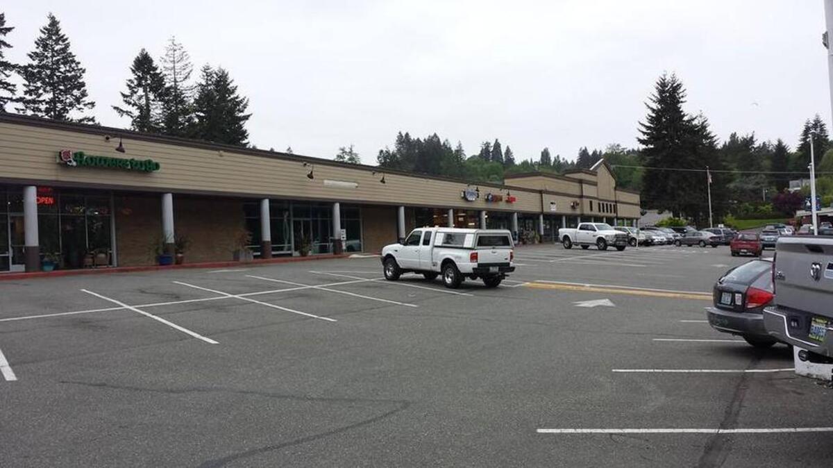 Town & Country Markets is considering a move to Peninsula Shopping Center in Gig Harbor.
