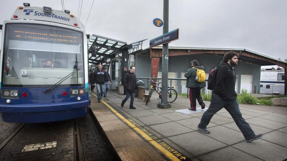 Pierce Transit has plans for "transit-oriented development" on the property at 415 East 25th St. (rear). Link passengers disembark by Tacoma Dome Station, March 9, 2016.