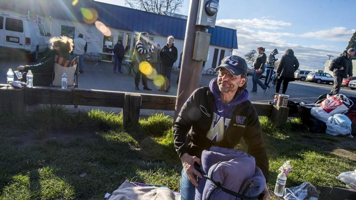 Ernest Schaef Jr. packs March 16 after the New Hope Resource Center in downtown Puyallup closed its doors.