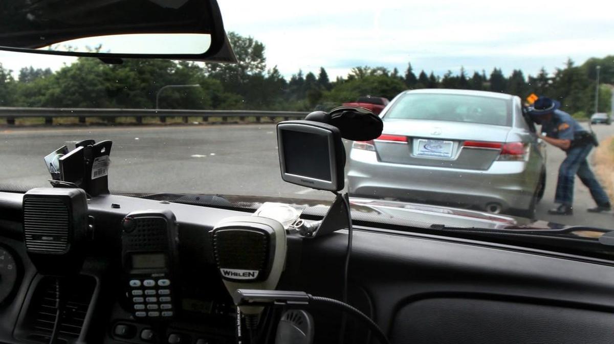 State law says you must stop immediately when being pulled over by a law enforcement officer or approached by an emergency vehicle.