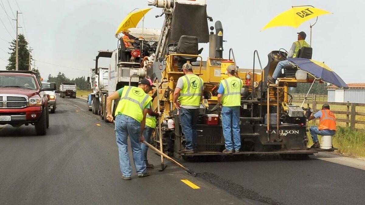 A Lakeside Industries' work crew begins their resurfacing project along Old Highway 99 near the City limits of Tenino June 1st as they move west towards Violet Prairie Road.