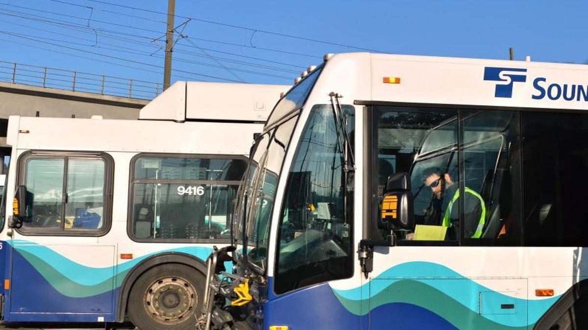 Pierce Transit driver Andrew King completes paperwork before making his afternoon run from Seattle to Pierce County earlier this month.