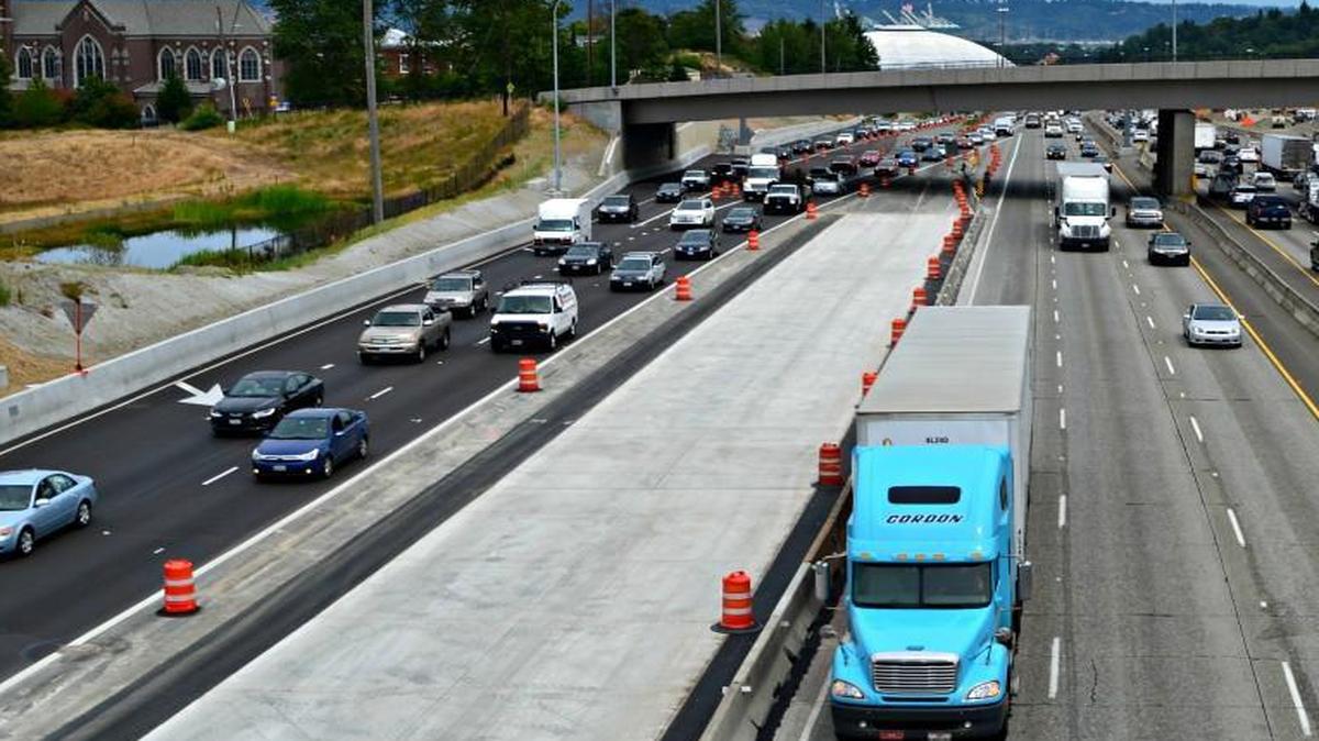 Crews working for the Washington Department of Transportation are scheduled to remove the construction “island” on southbound Interstate 5 through Tacoma overnight Wednesday. The island, to the left of the tractor trailer, allowed workers to replace the surface of the freeway.