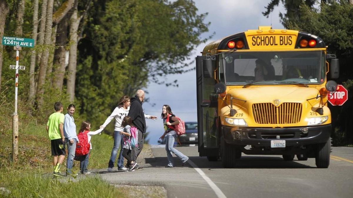 State law states bicyclists must abide by same laws as drivers, which means they must stop for school buses dropping off children.
