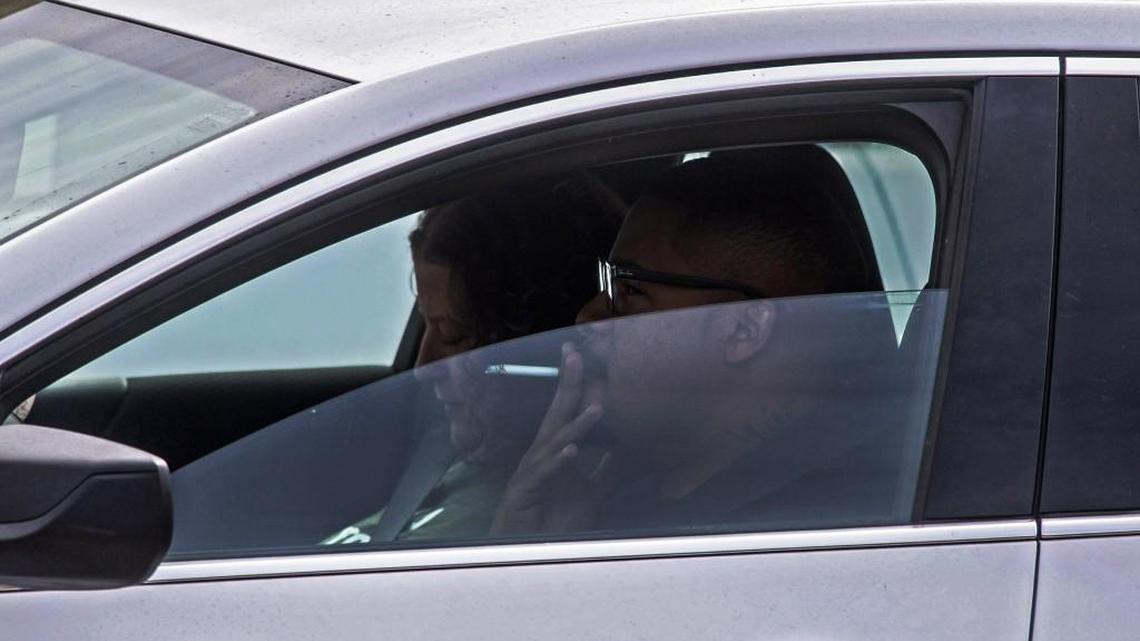 A man smokes a cigarette while driving in Tacoma. It’s illegal to throw cigarette butts out your car window, and doing so could result in a steep ticket, according to Washington State Patrol.