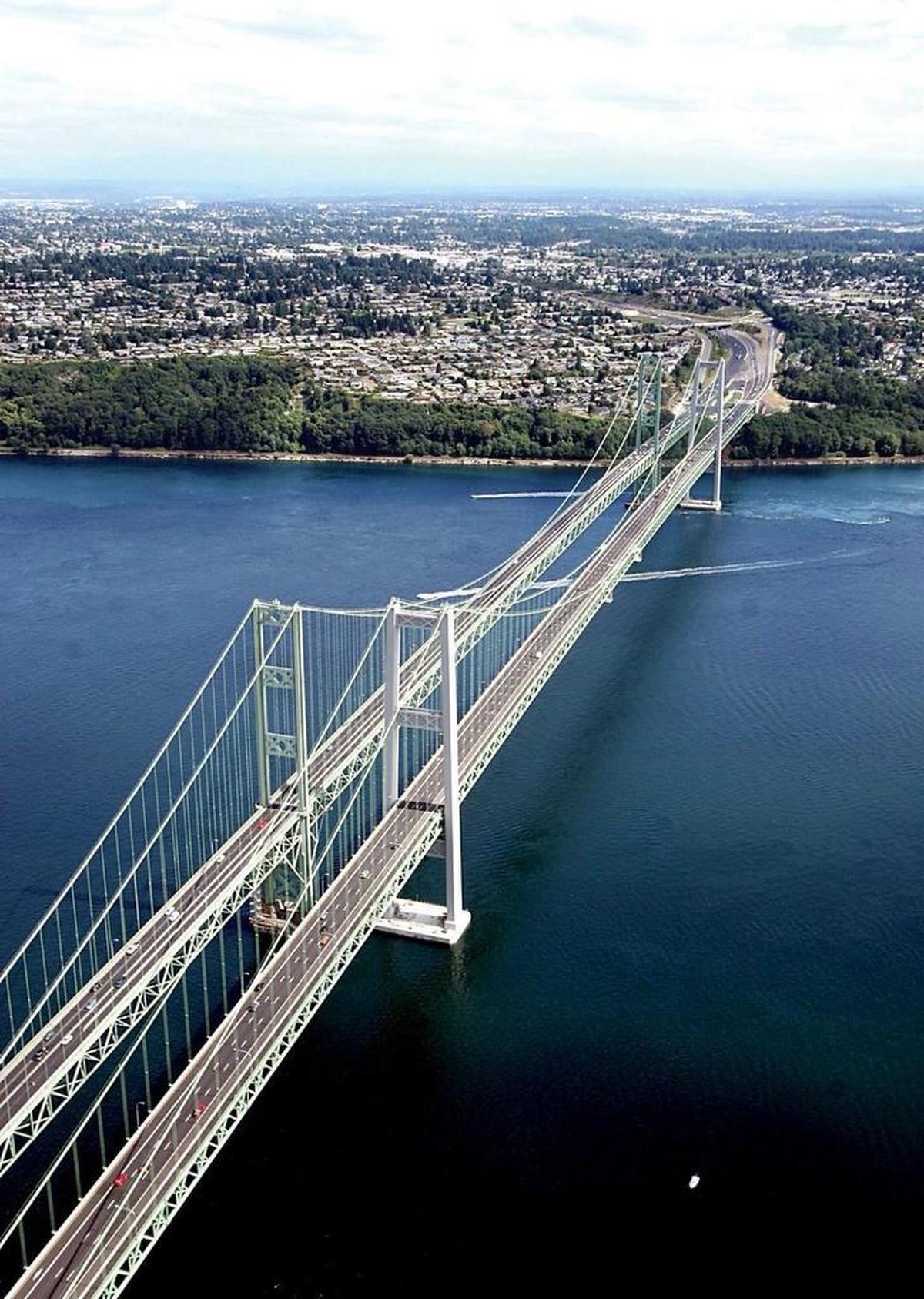 The old and new Tacoma Narrows Bridges together shortly after their opening in 2007.