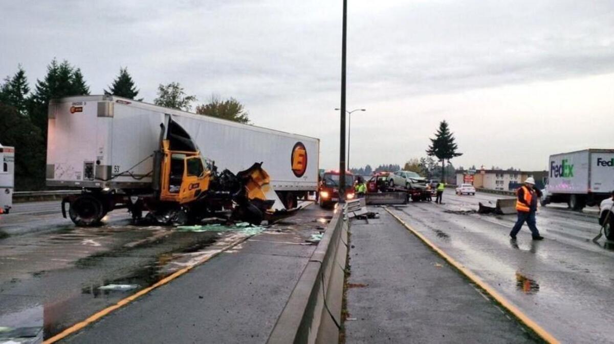 A tractor trailer crashed into a jersey barrier on Interstate 5 in Lakewood on Wednesday morning. No one was injured, but traffic was backed up for miles in both directions.