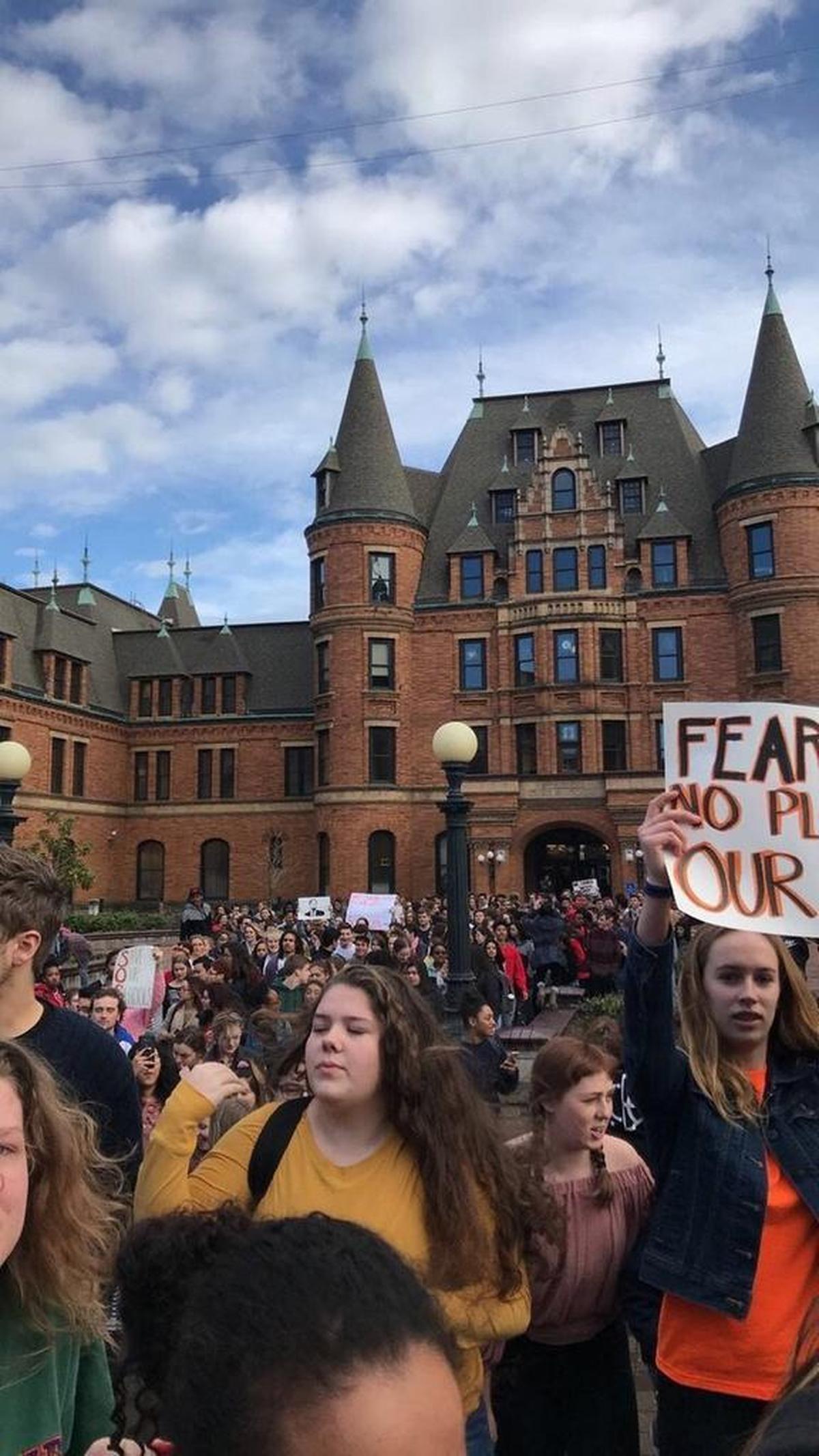 Students walked out of class Wednesday as part of a national movement to encourage stricter gun laws.