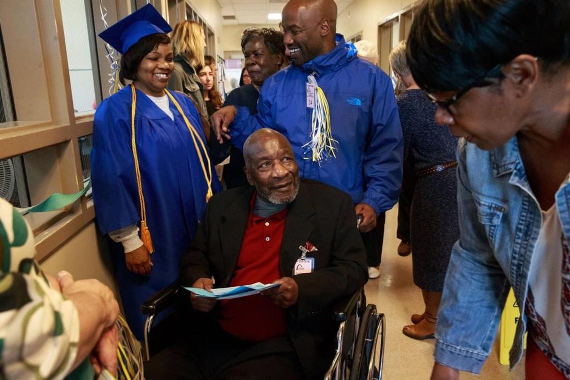 Valedictorian Tonya Wilson says goodbye to her family after graduation day at the Washington Corrections Center for Women in Gig Harbor.