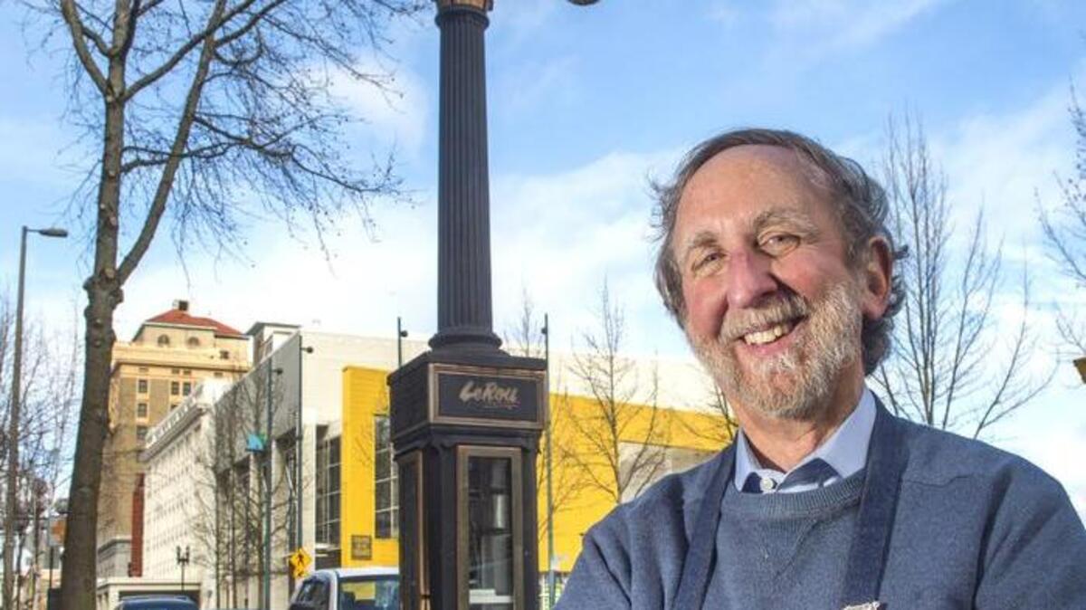 Steph Farber, co-owner of LeRoy Jewelers in Tacoma, says he winds the large, free-standing clock outside his shop once a week and resets it to the bi-annual daylight savings time changes the night before.
