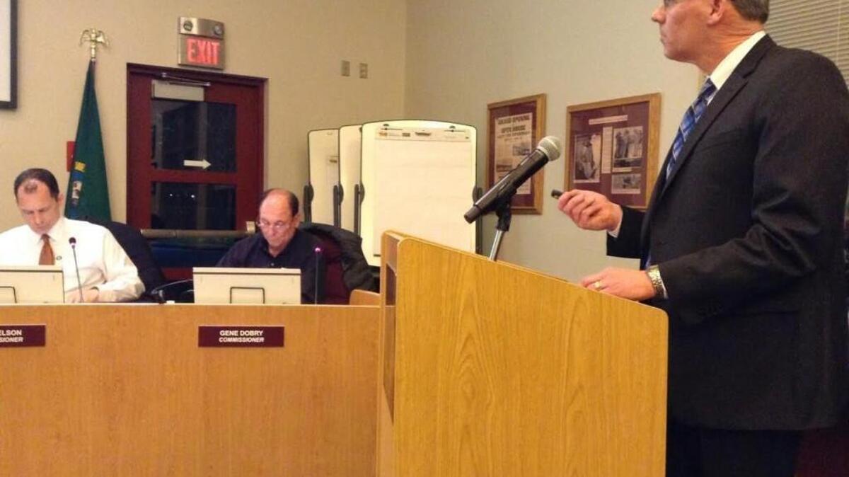 D.A. Davidson senior vice president Jim Nelson presented four bond financing options to the Lacey Fire District 3 Board of Fire Commissioners on Thursday. Commissioners Tom Nelson (far right) and Gene Dobry follow along.