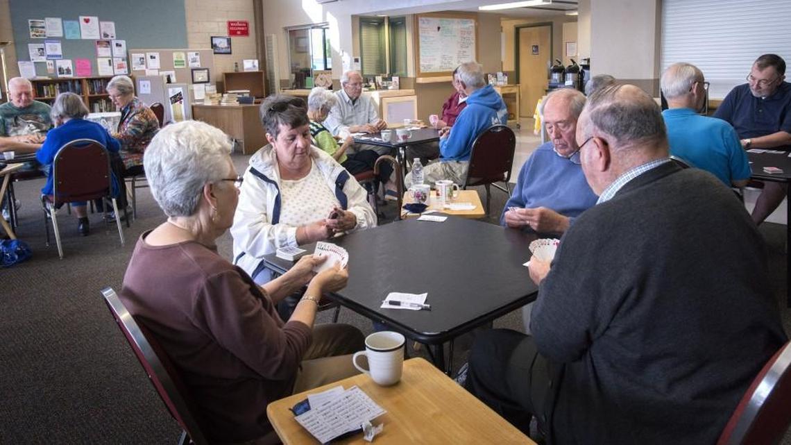 Seniors gather to play Bridge at University Place Senior Center in University Place. The city will stop funding its recreation programs, including its many senior activities, after Dec. 31. But a local nonprofit will keep the center and its programming going, starting Jan. 2.