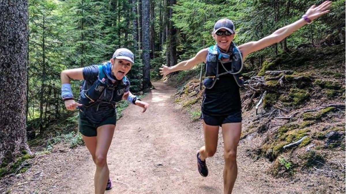 Allison Macsas and Mallory Brooks stuck together while running the 93-mile Wonderland Trail that circles Mount Rainier, finishing their trek in just over 29 hours and setting a new unsupported speed record for women.