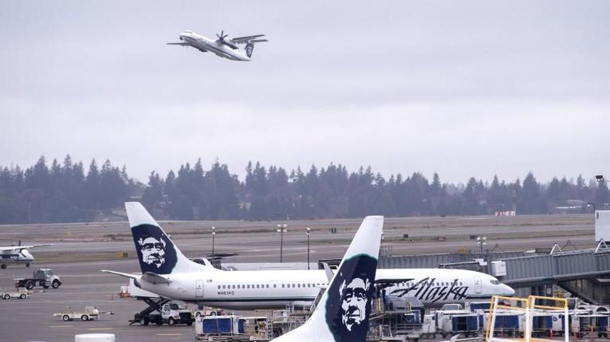 Alaska Airlines airplanes taxi away from the north terminal at SeaTac Airport in SeaTac in 2015.