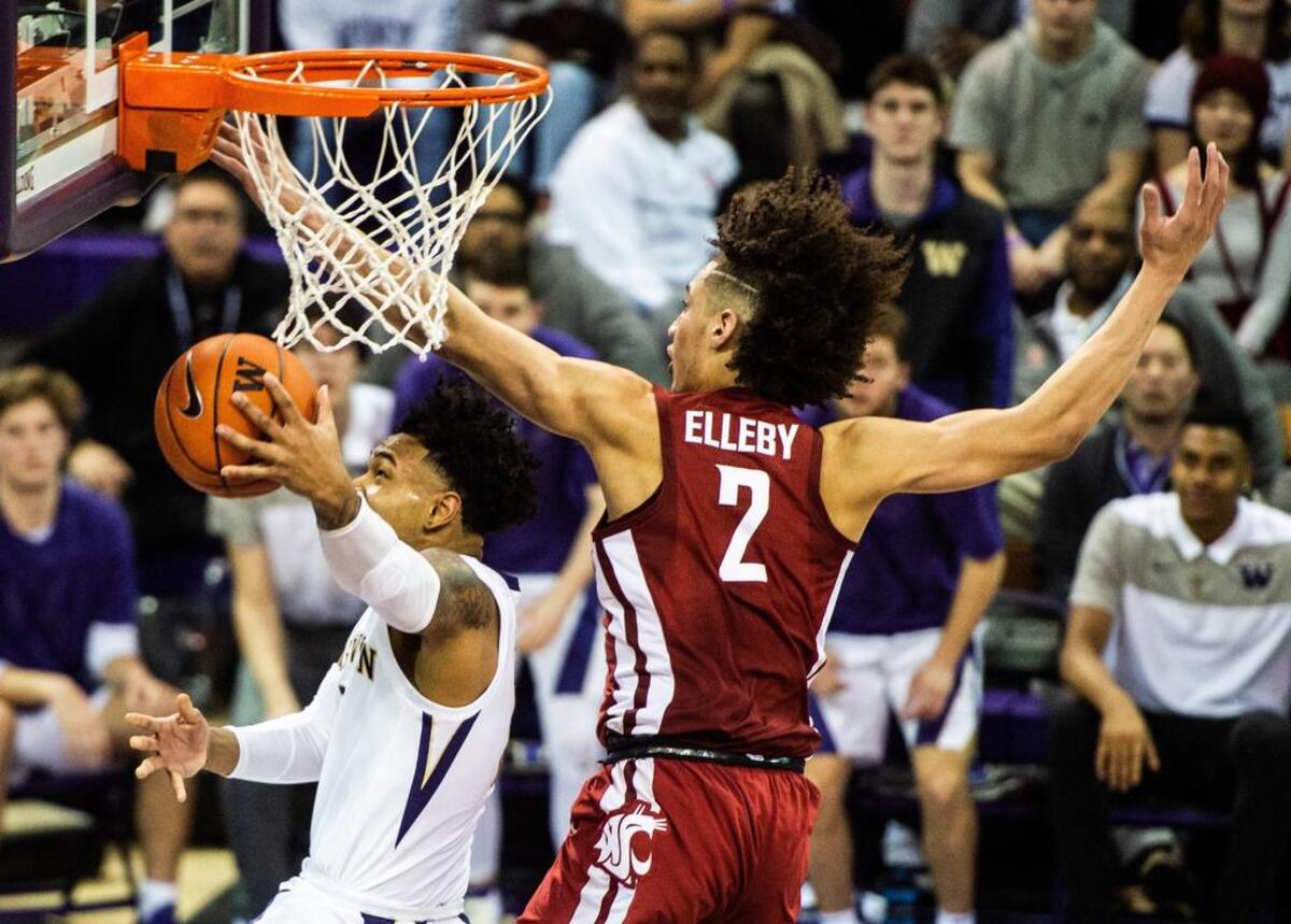 University of Washington guard David Crisp (1) goes up for a shot while defended by Washington State’s CJ Elleby (2) in the second half. Washington played Washington State in a NCAA basketball game at Hec Edmundson Pavilion in Seattle, Wash., on Saturday, Jan. 5, 2019.