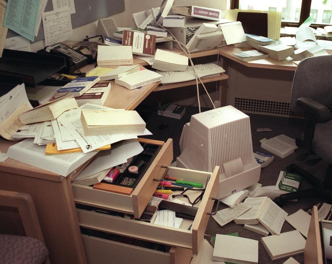The desk of a budget-writing staffer of the Washington State Senate Ways and Means Committee in his office on the 3rd floor of the John Cherberg Building in Olympia, WA was a mess after a computer and many reference materials crashed to the floor during the 6.8 earthquake at 10:55 a.m. on Wednesday, February 28, 2001.